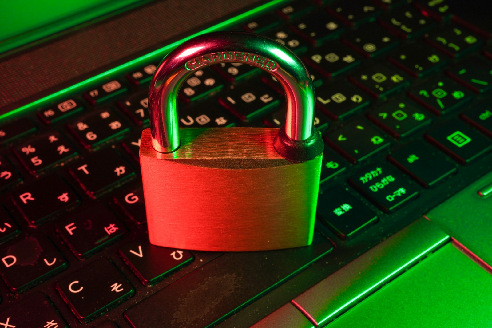 Person reviewing account security settings on a laptop at a kitchen table